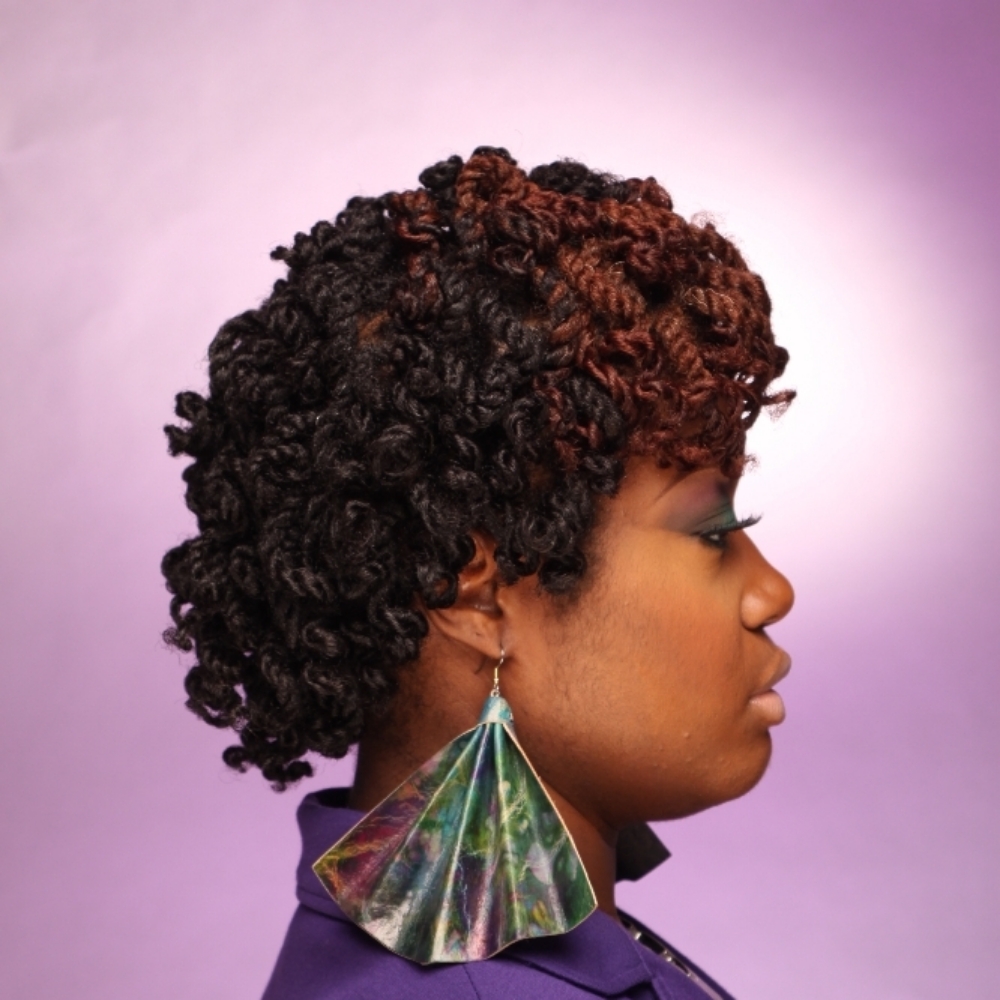 Two strand twists at Divine Elements by Temi in Hampton, GA