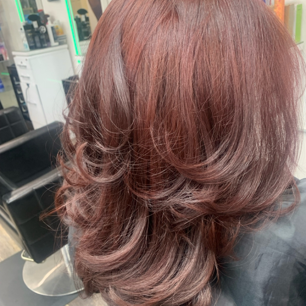 Hair Blowout Styling at Giselles hairstyle corp. in Bronx, NY