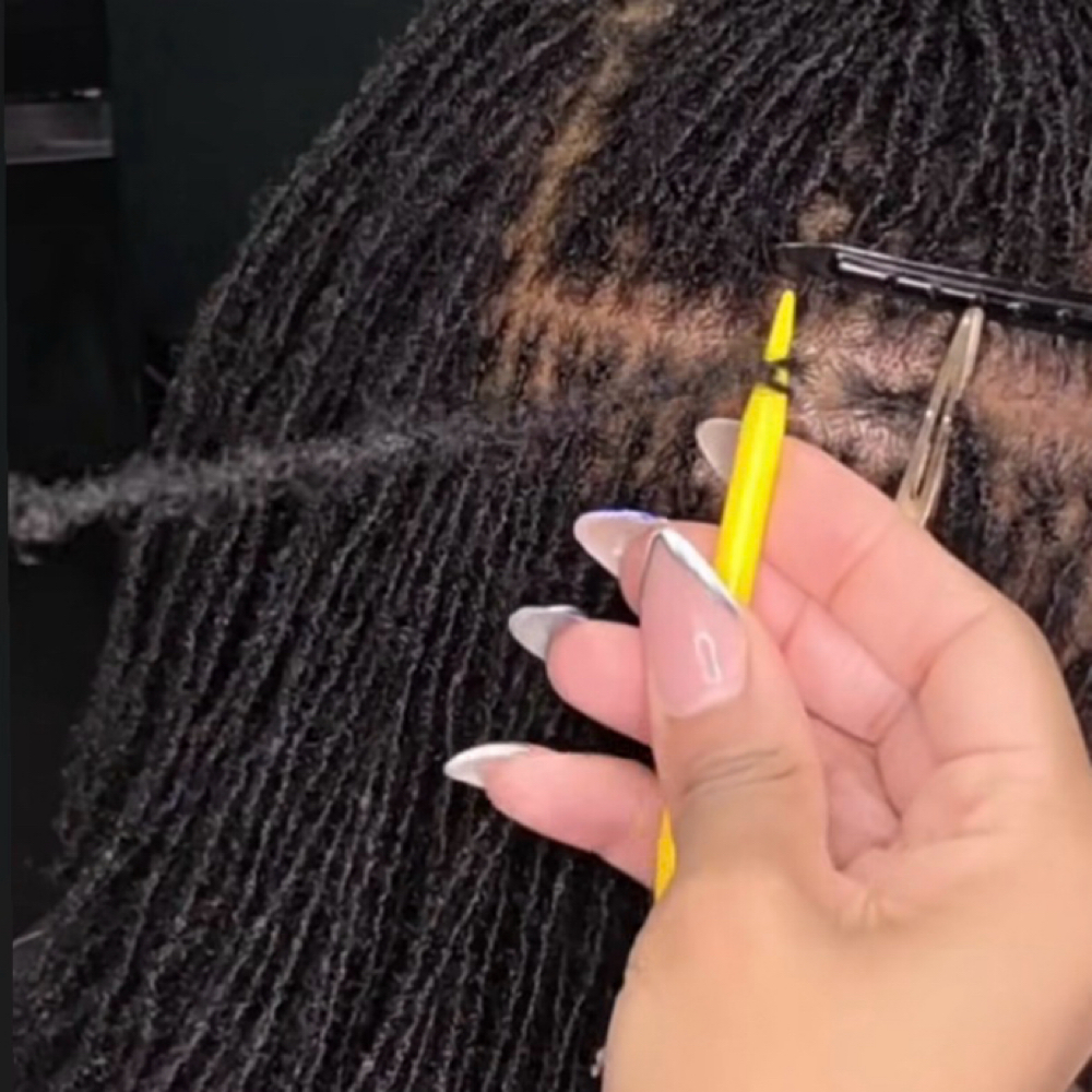 Microlocks Retie at Afrokreyol braiding salon in Plantation, FL