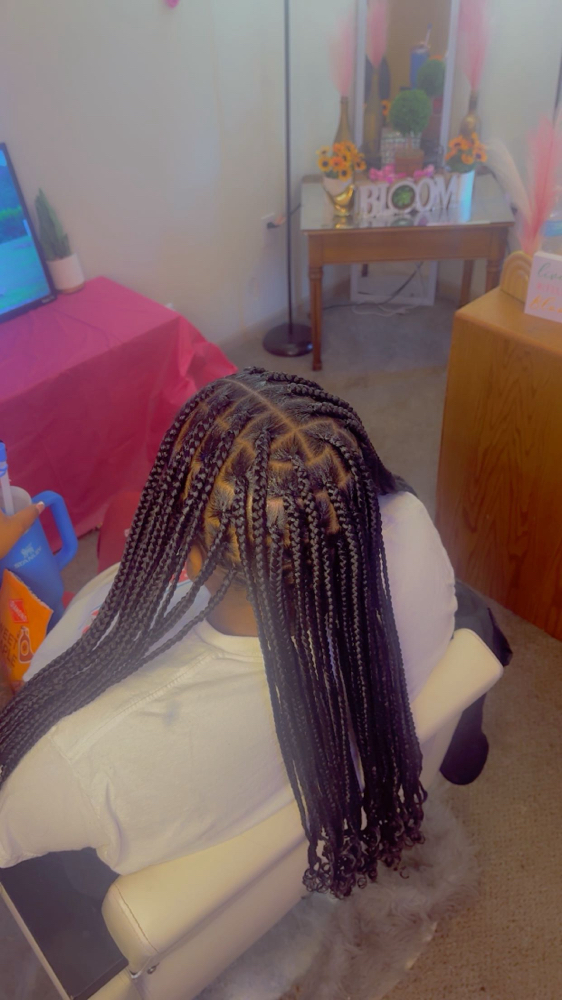 Smedium Knotless Box braids at Nays Beauty Parlor in Warrensbug, MO