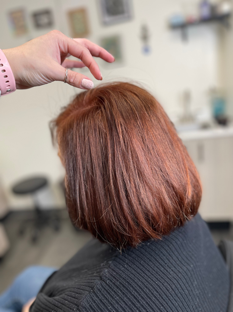 Short Woman’s Haircut With Blow Out
