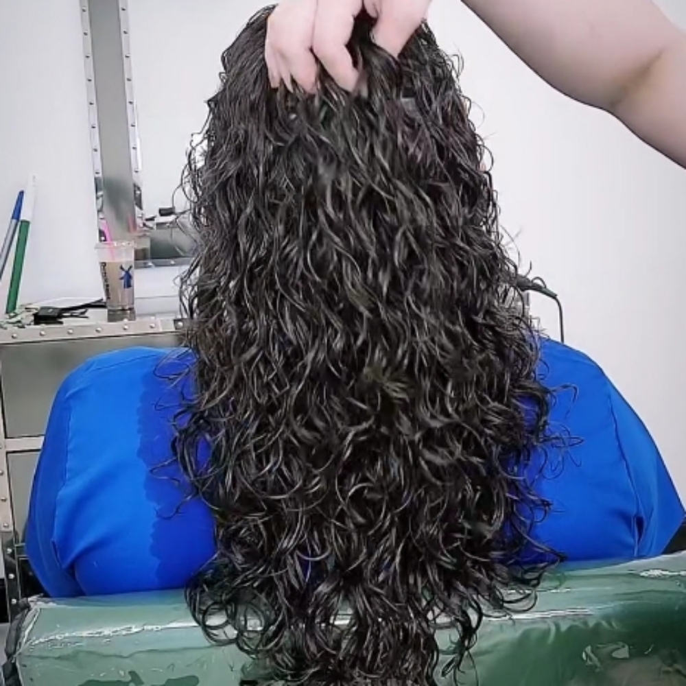 Curly Hair Cut at Miah Worthwhile in San Antonio, TX