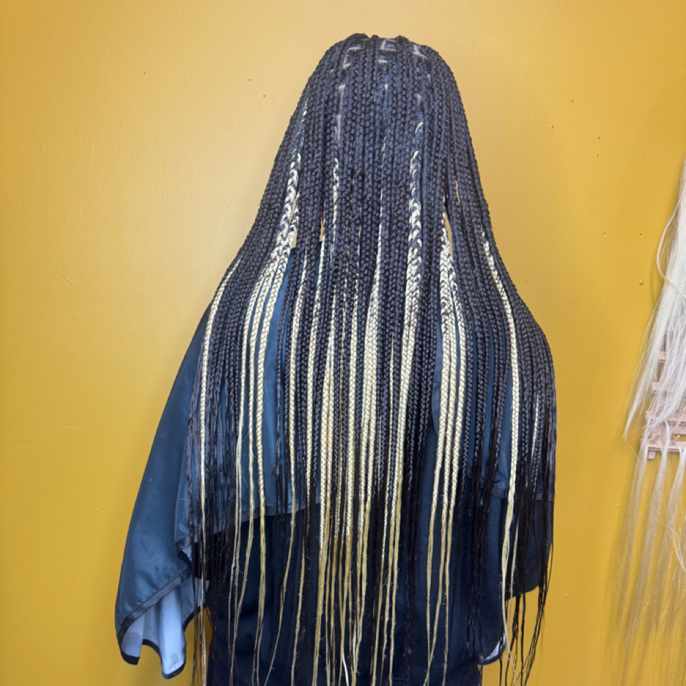 Smedium Knotless Braids at LAVISH BRAIDS in Buffalo Sc, SC