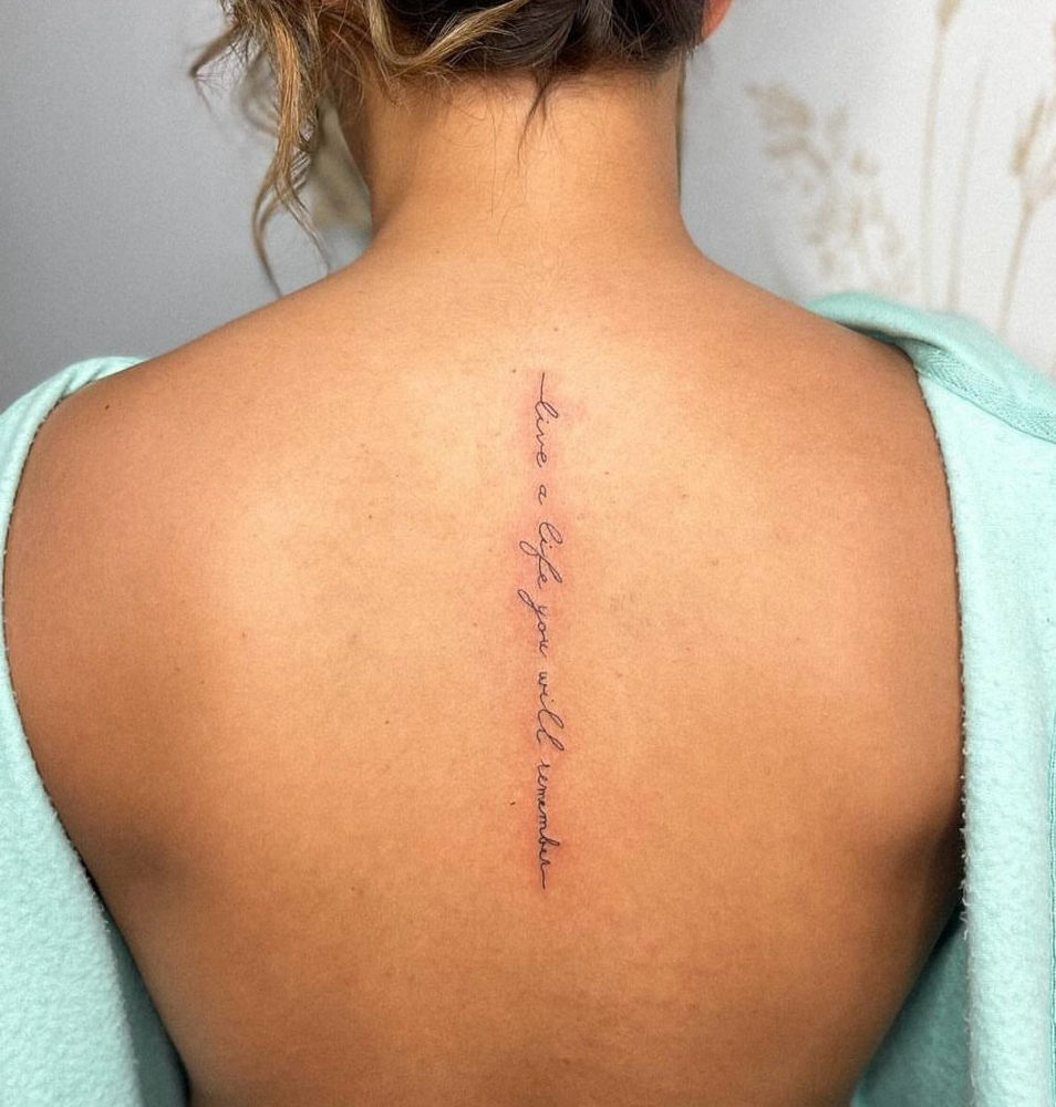 Script Spine Fine Line Tattoo
