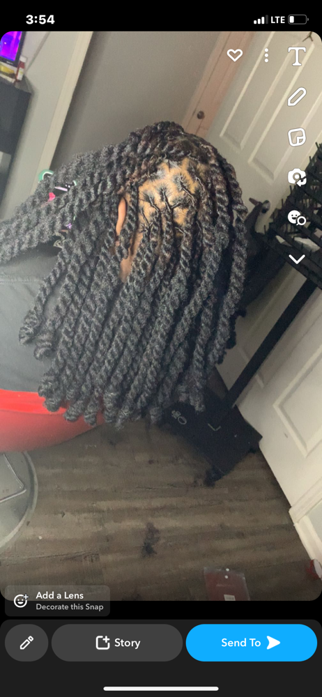 Invisible Locs Over Dreads at Hair Hustlaaa! in Humphrey, AR