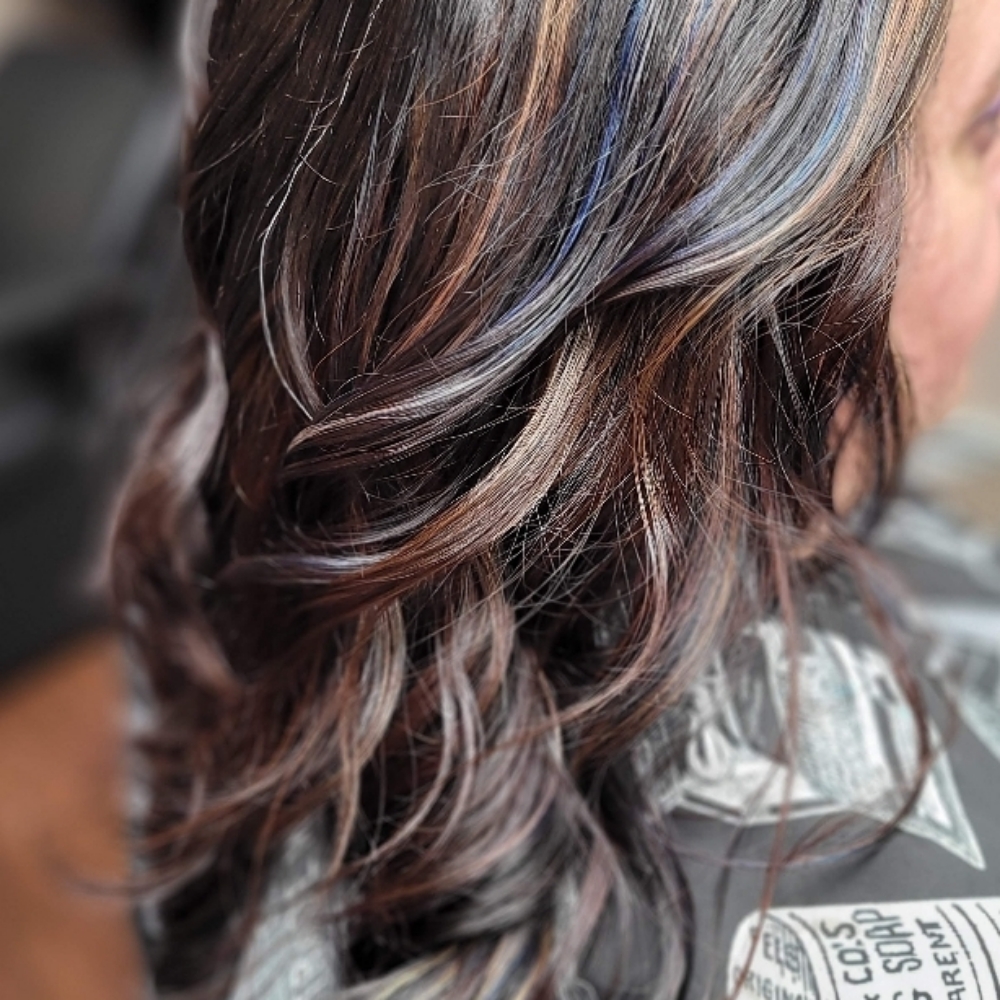 Curl or Flat Iron at Mallory's Hair Utopia in Saint Johnsville, NY