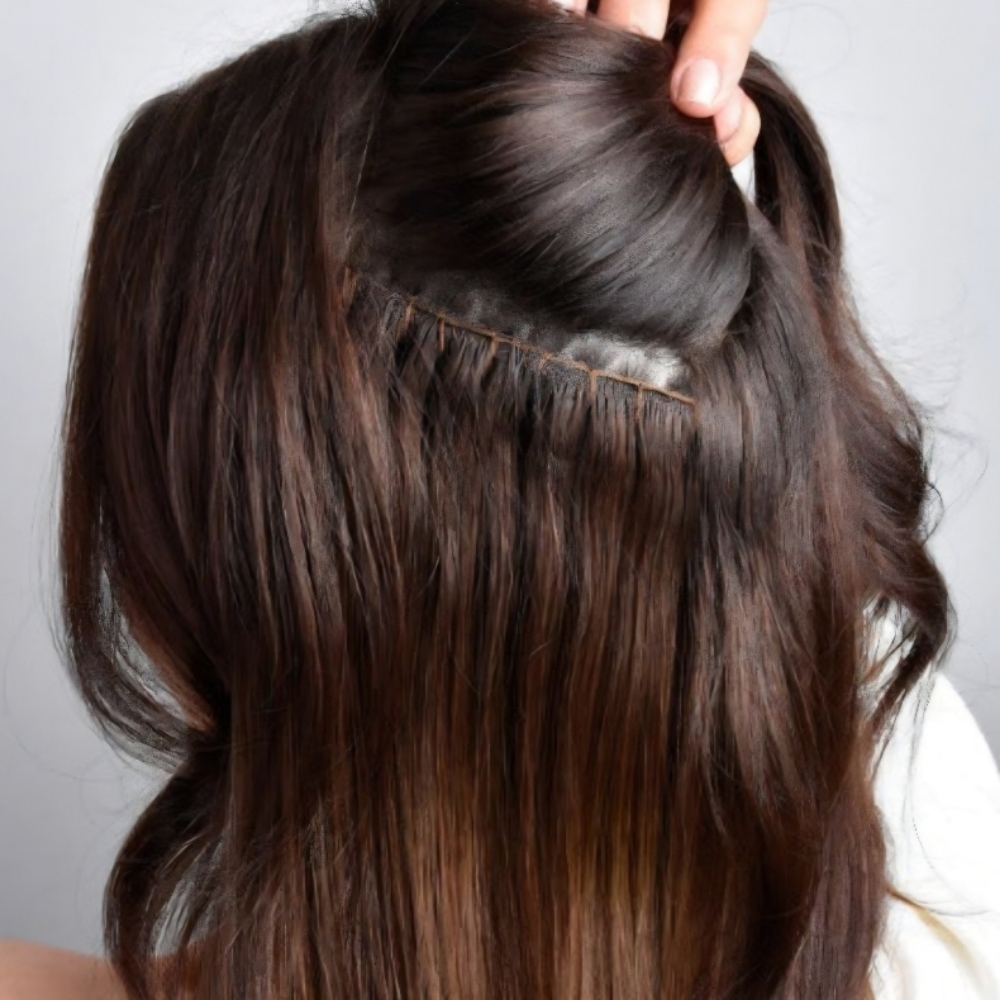 Beaded Sew In Hair Extensions at Honey Hair Lounge in Wimberley, TX