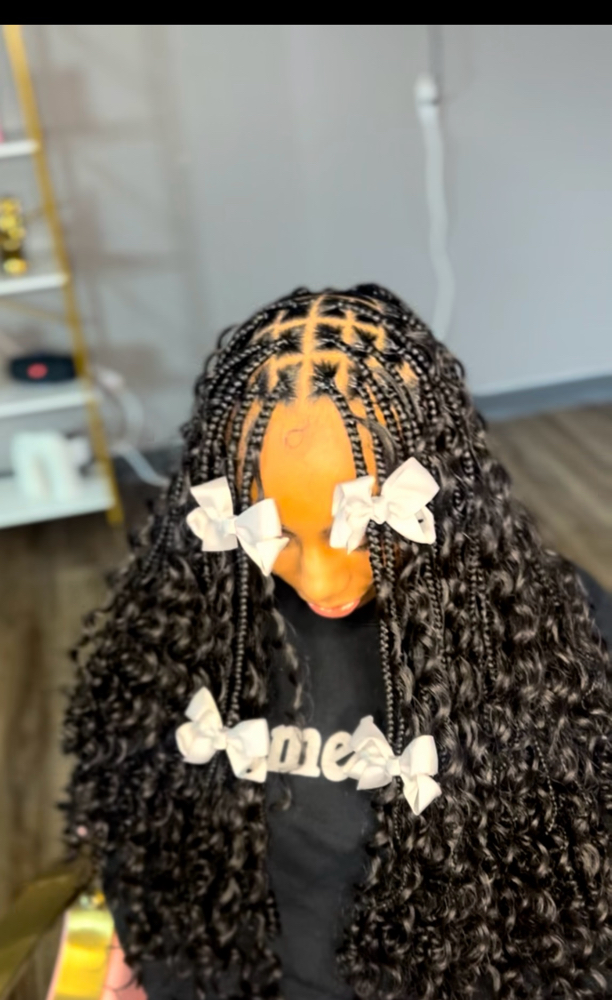 Smedium Boho Knotless Braids at JackieofAllStrandz in Chattanooga, TN