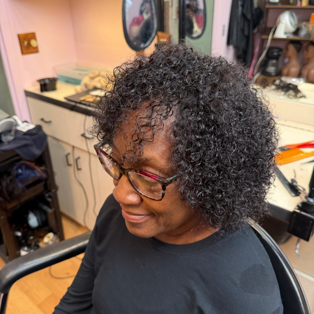 Traditional Sew In at Janel Monae Restorative Hair Clinic in Creve Coeur, MO