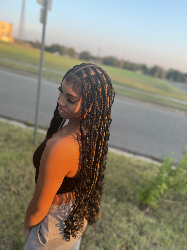 Loose Deep Boho at BraidsByJinece in Wichita, KS