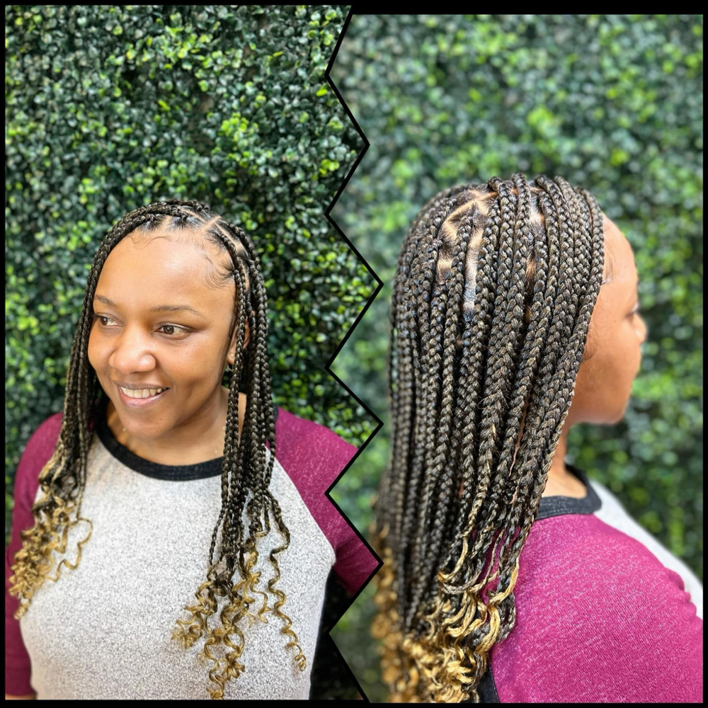 Medium Knotless Braids at DeeplyRootedSalon in Iowa City, IA