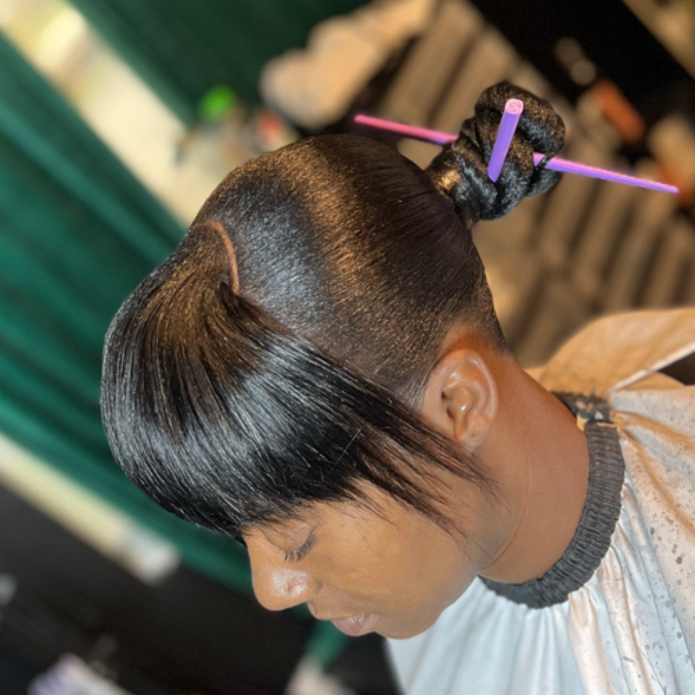 Low Bun w/ Bangs at Giftedbeauty360 in Jacksonville, FL