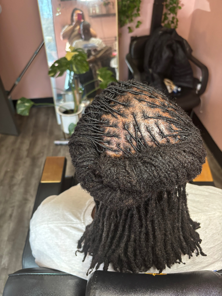 Small Loc Retwist (130-200ct) at Natural Beauty by Donecia in Knoxville, TN