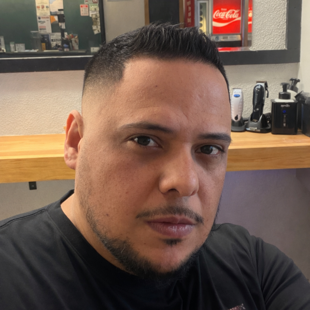 James Rivas at Pretzel city barbershop in Freeport, IL