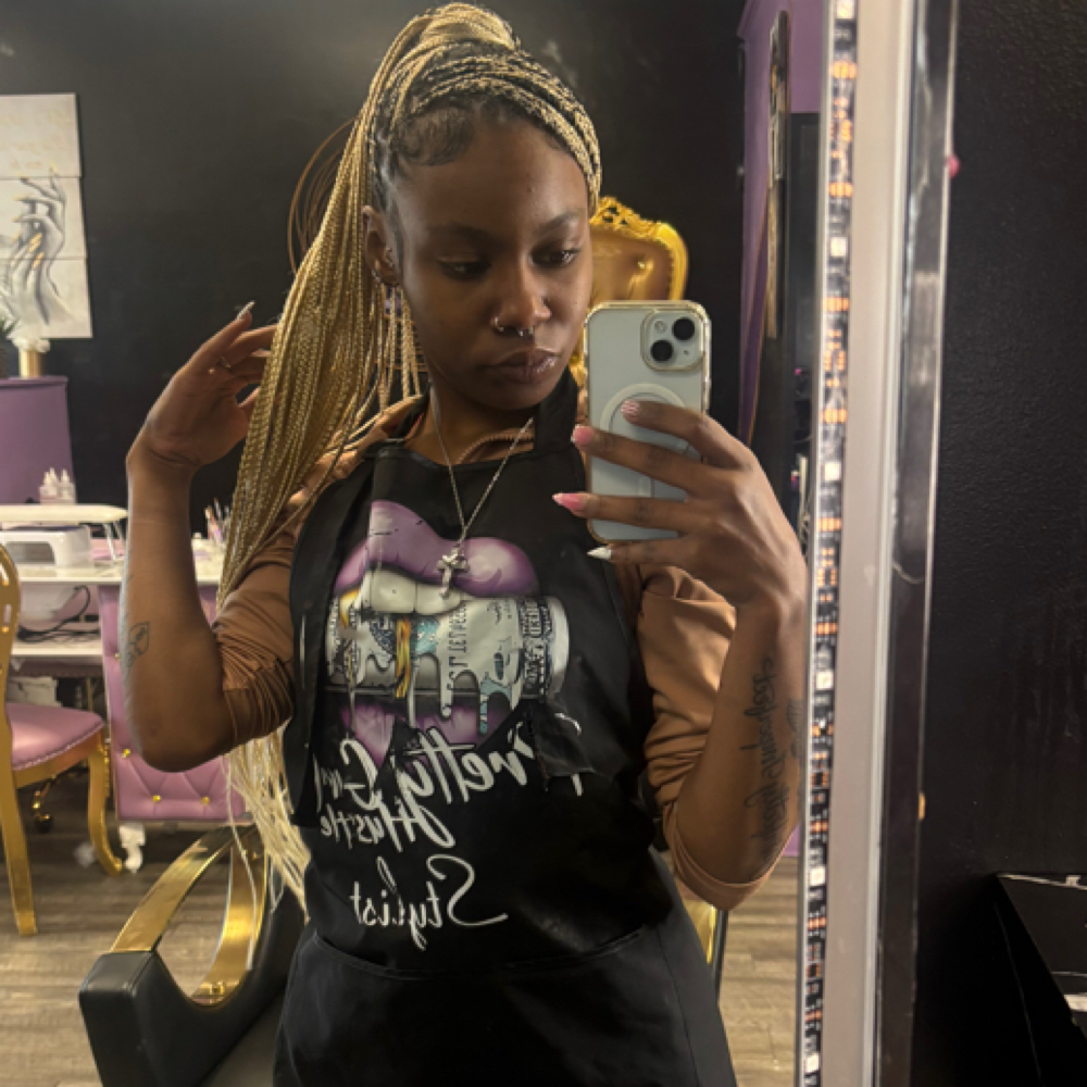 Jaishyra Holloway-Giles at The Hustlers Palace Salon in Whitehall, OH