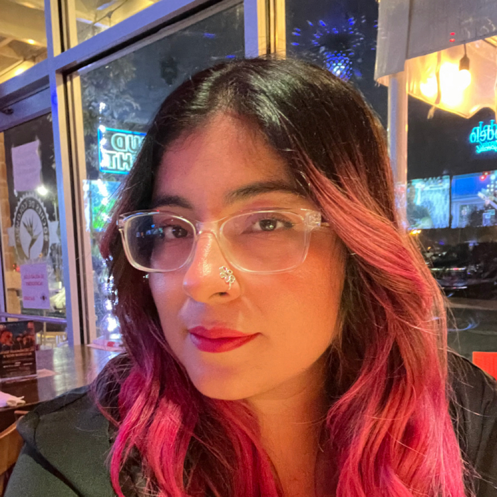 Elizabeth Ramírez at THRPYsuites Barbershop & Salon in Tampa, FL