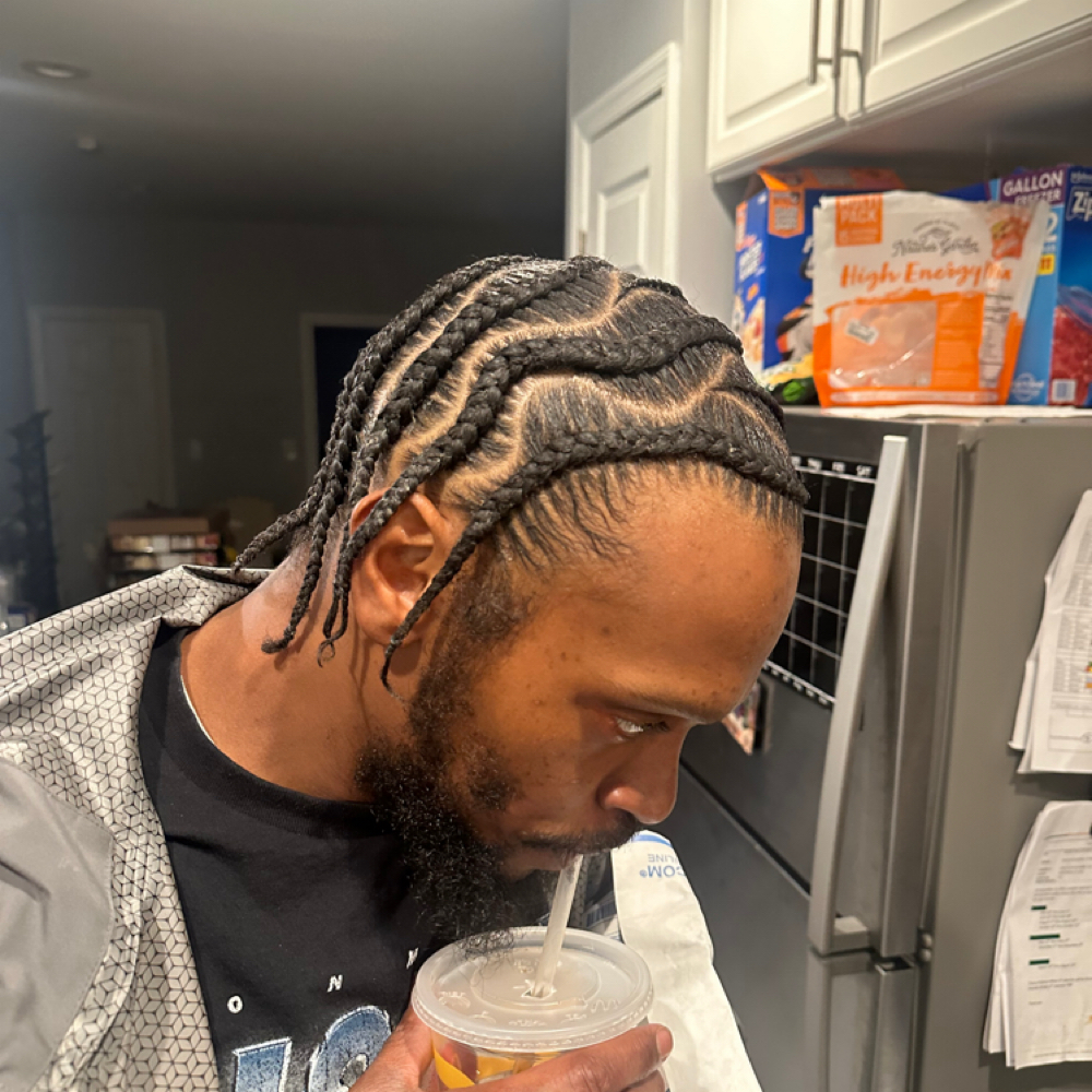 Manny Barnes at Beauty In ✂️ A Wink  LLC Barbershop& Salon in Windsor Mill, MD