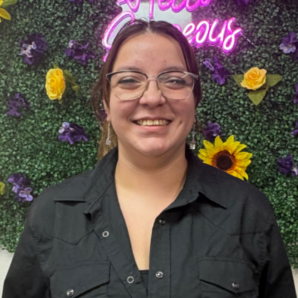 Yumalay Penado at Crowns Of Glory Hair Studio in Cleveland, TX