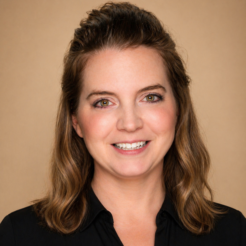 Meredith Villachica at E. Elliott Hair Therapy in Allen, TX