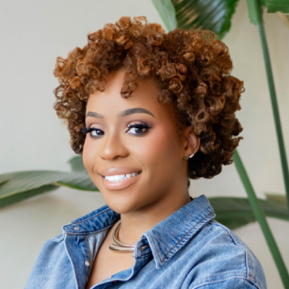 Essence Reid at Suede Curl Bar in Mableton, GA