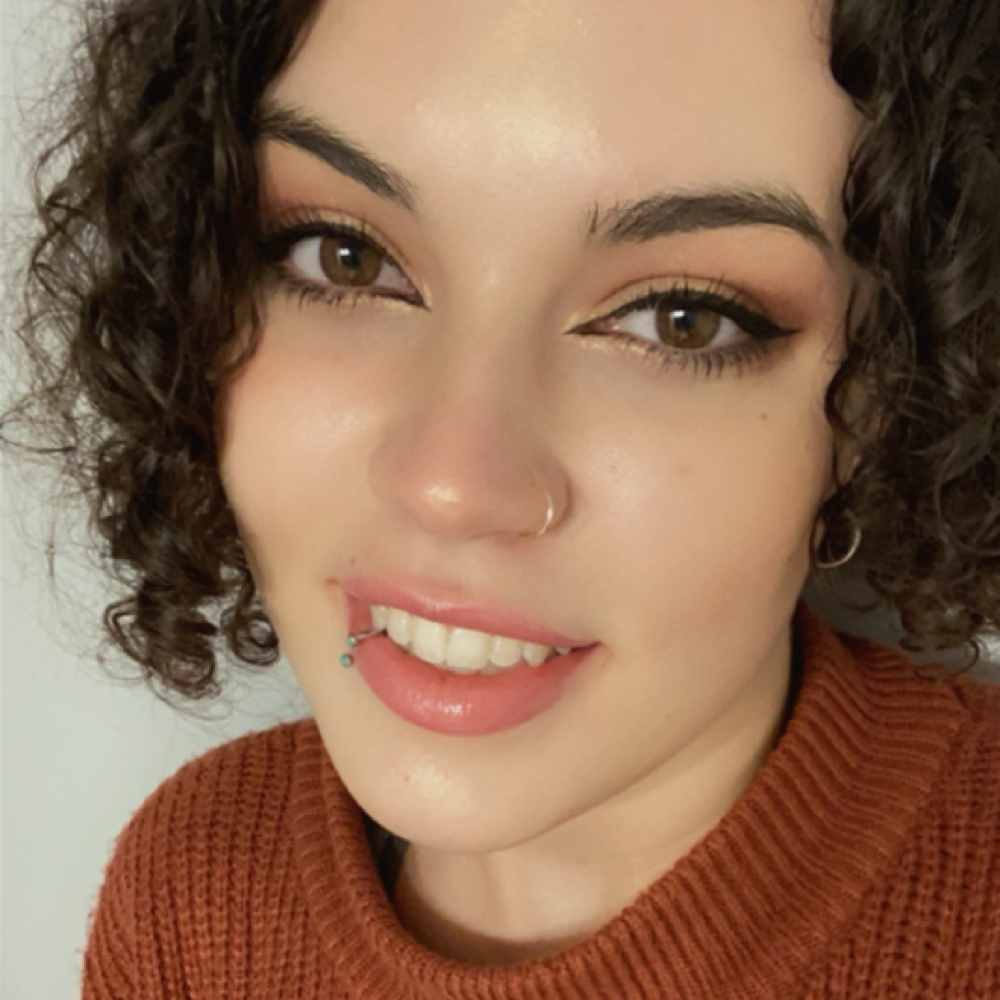 Kalei Canter- books open at Claws and Clover in Waynesville, NC