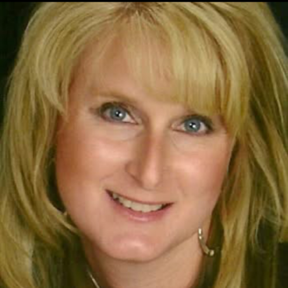 Andi Smith at Odyssey Full Service Salon, Inc. in Versailles, IN