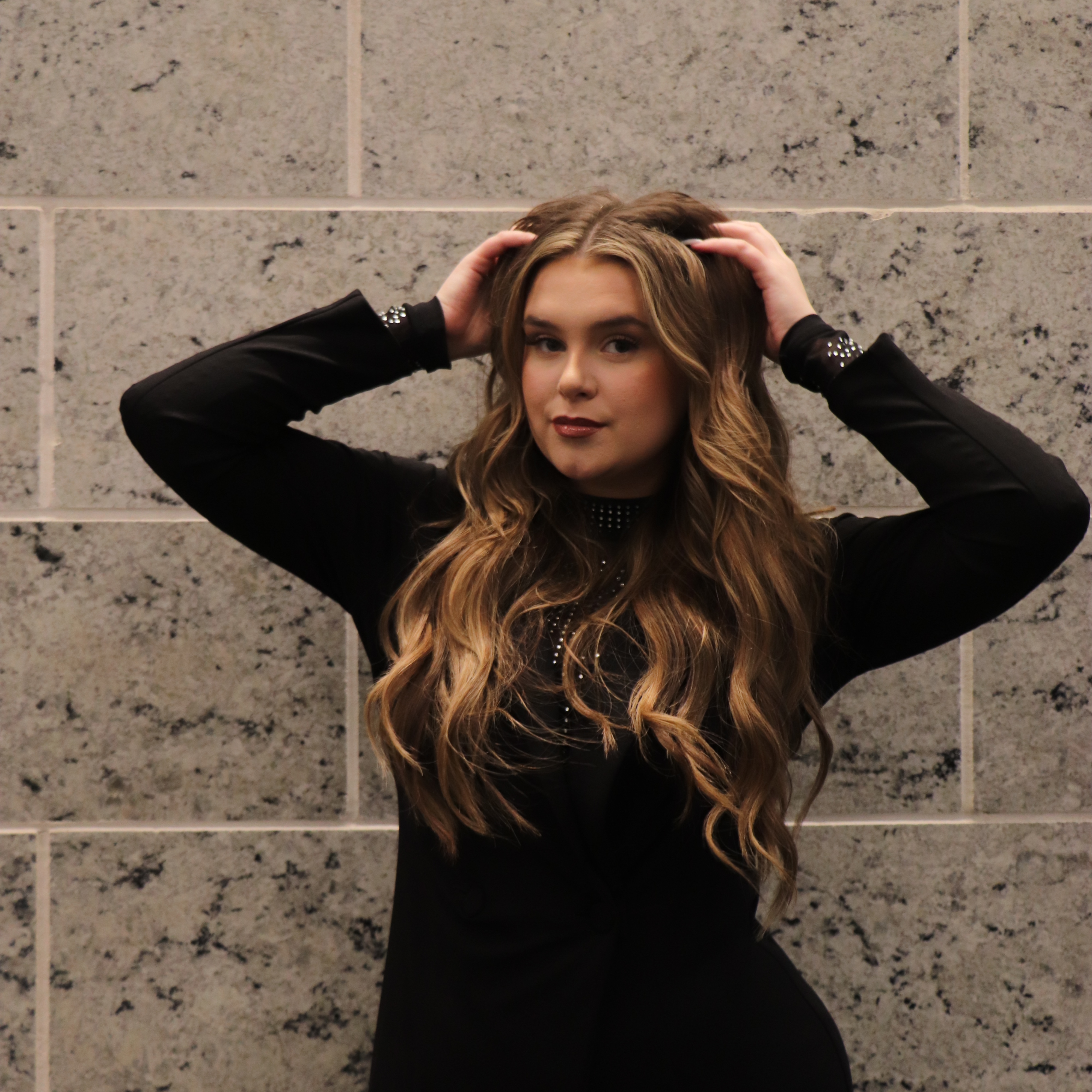 Kaylee MacManus at Reveal Hair Studios in frisco, TX