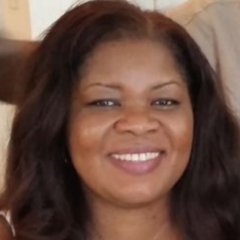 Esther Kwashie at Elite Hair Studio and Spa in Philadelphia, PA