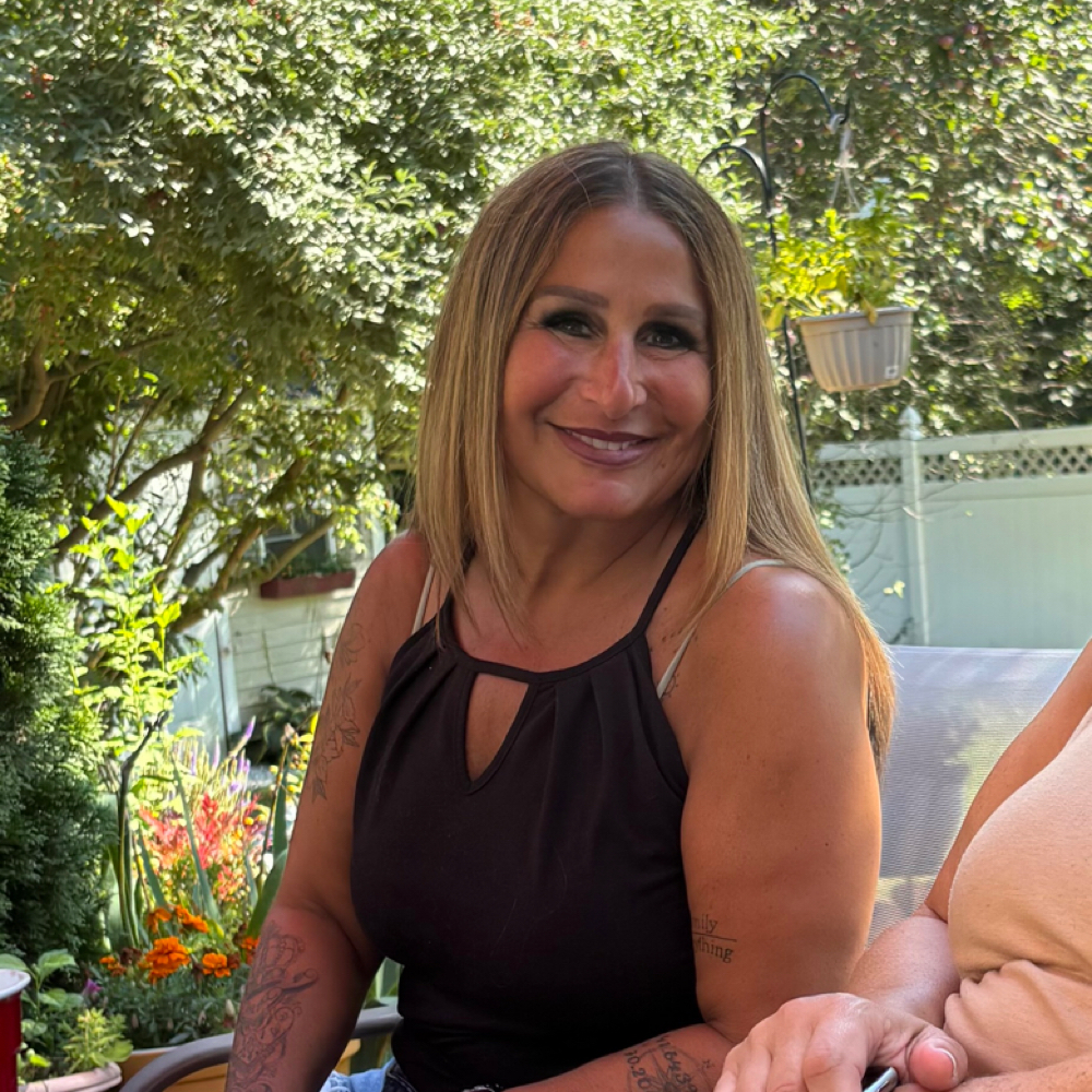 Susan Porcelli at Tangles Salon LLC in North Providence, RI
