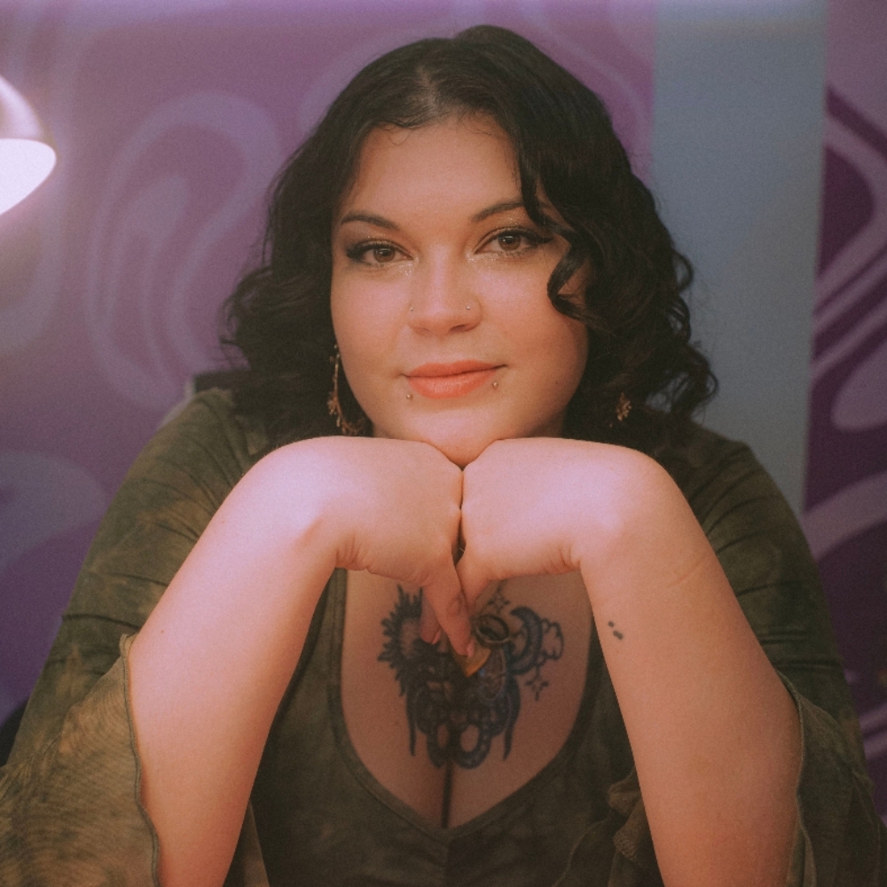 Kayles Canter -books open at Heartbreak Nail Club in Asheville, NC