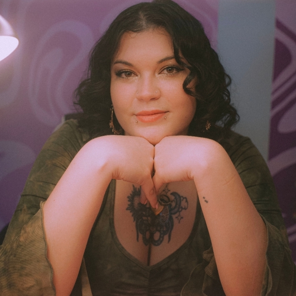 Kayles Canter -books open at Heartbreak Nail Club in Asheville, NC