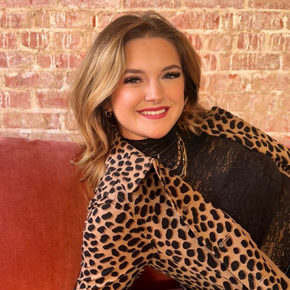 Emma Honigsberg at Blown and Bronzed with Shimmer Airbrush Tanning in STILLWATER, OK