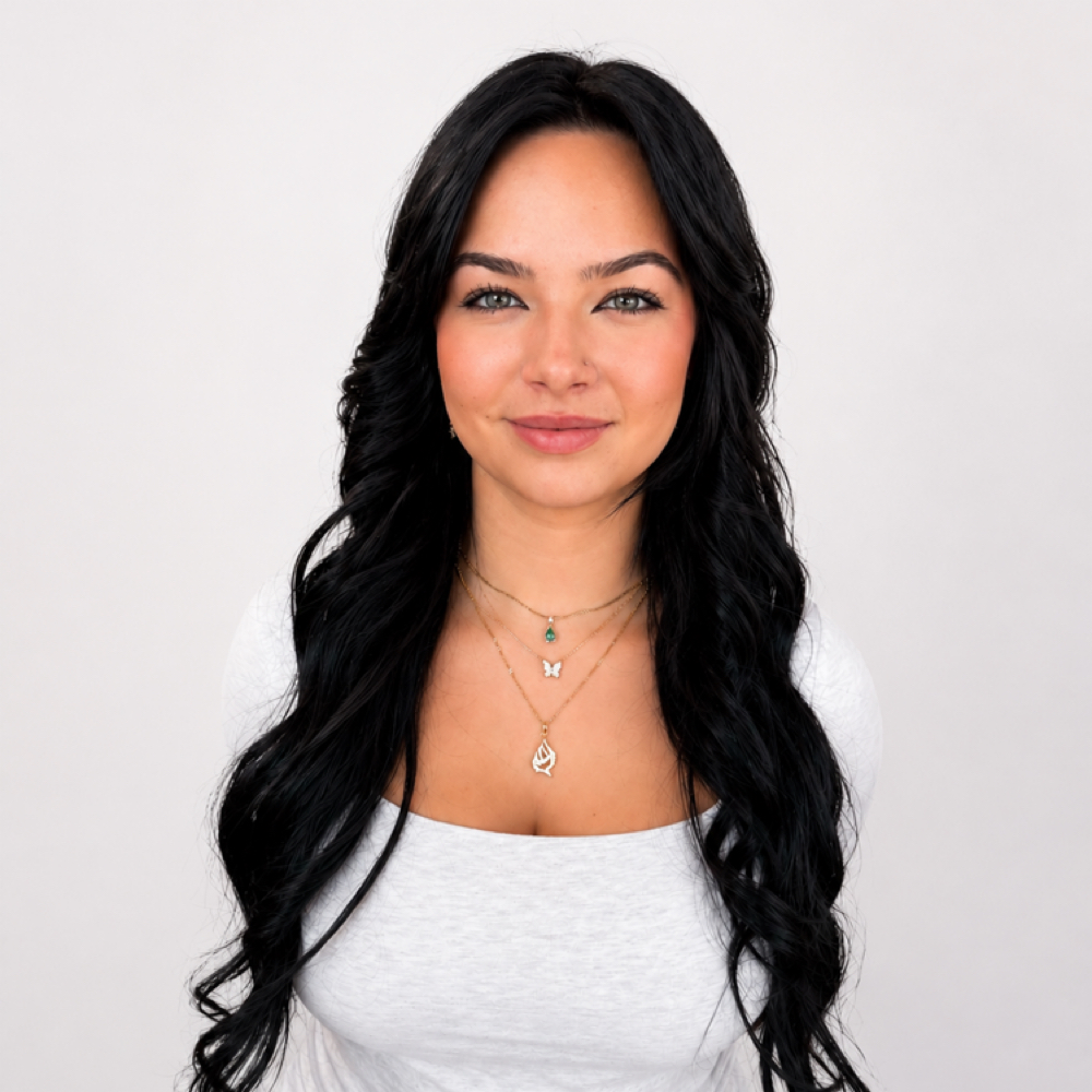 Elle Foster at E. Elliott Hair Therapy in Allen, TX