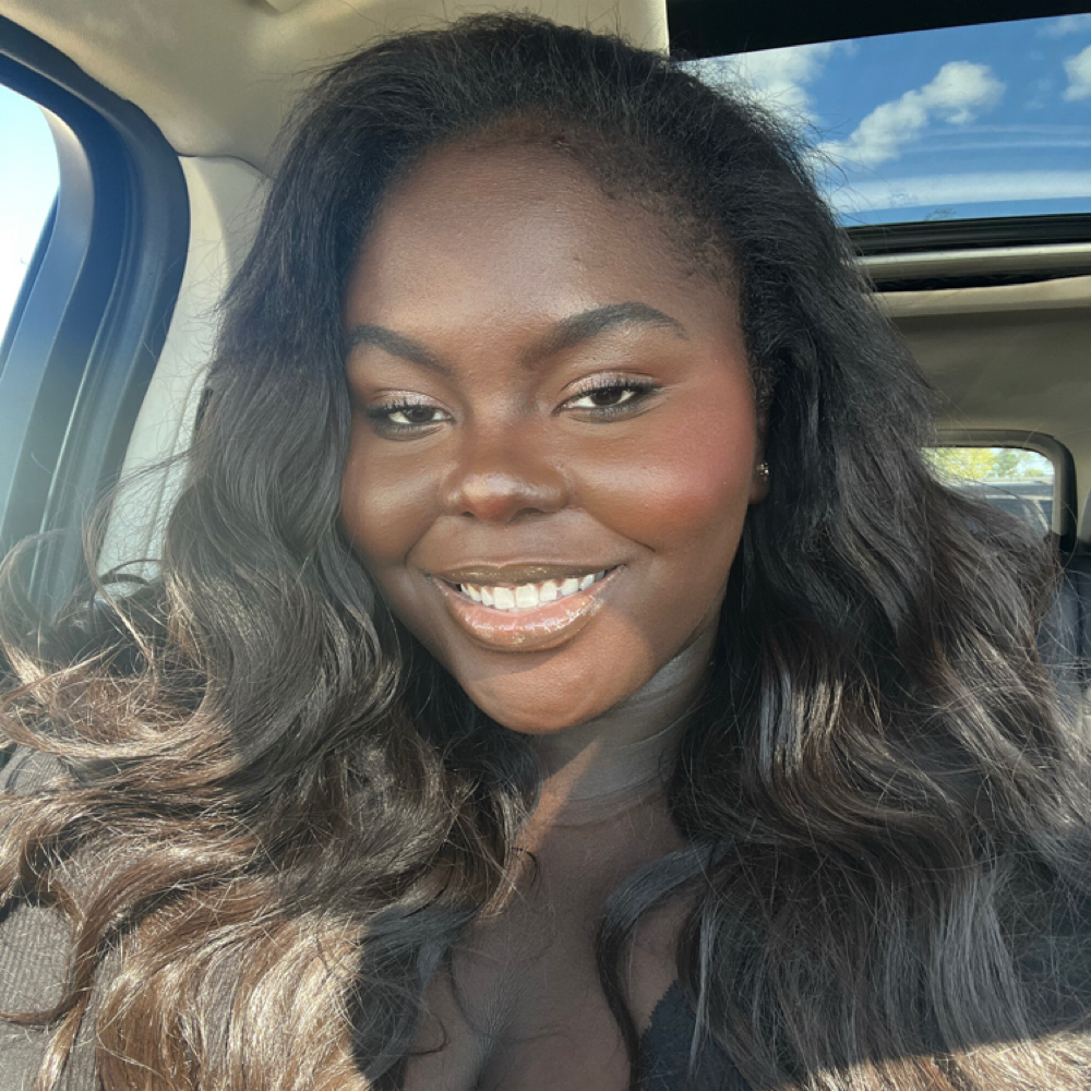 Asantewa Reide at SHE Shop Co. in Lansing, MI