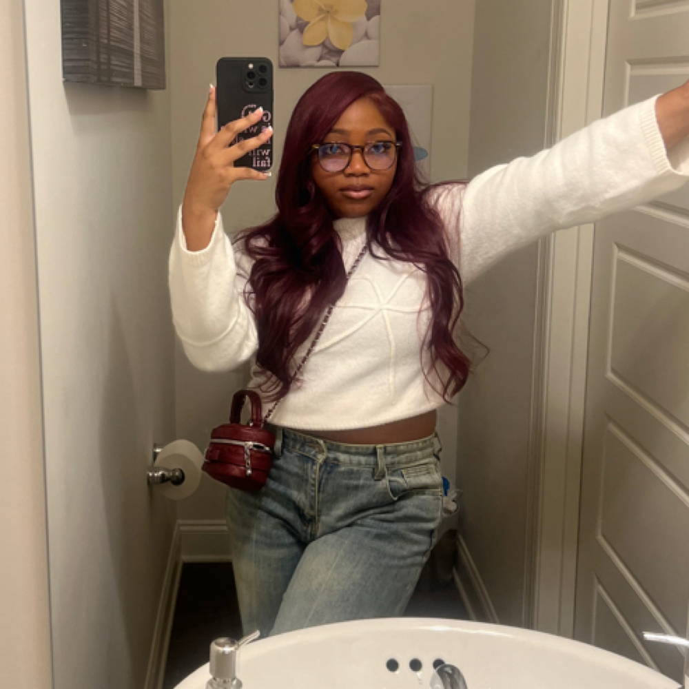 Elryuna Benson at The Press Bar Hair Salon in Birmingham, AL