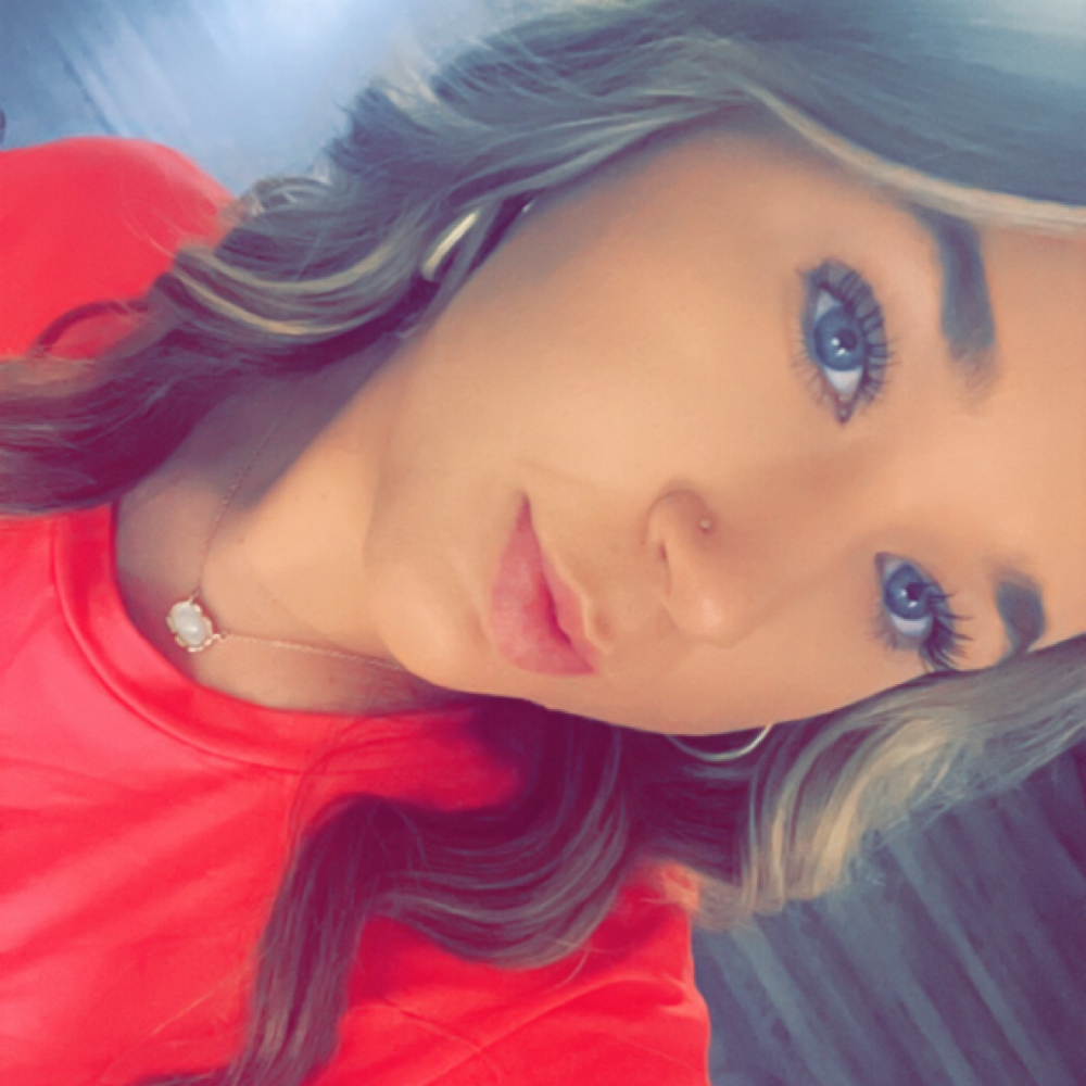 Madison Holmes