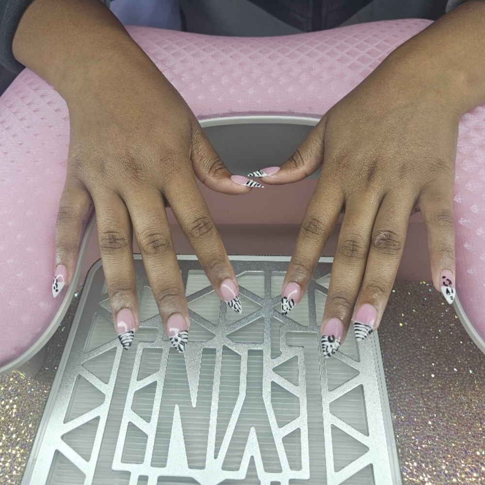Charron Hill at EXCLUSIVELY YOURS Nail Studio in Westland, MI