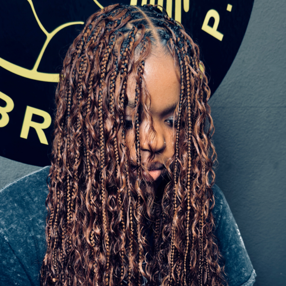 Charlene Lukebo Mbata at Chez Chacha Hair Braiding in Fort Collins, CO
