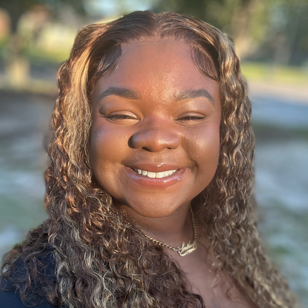 Deasia Smiley at The Luxe Salon, Academy and Hair Restoration in Garden City, GA