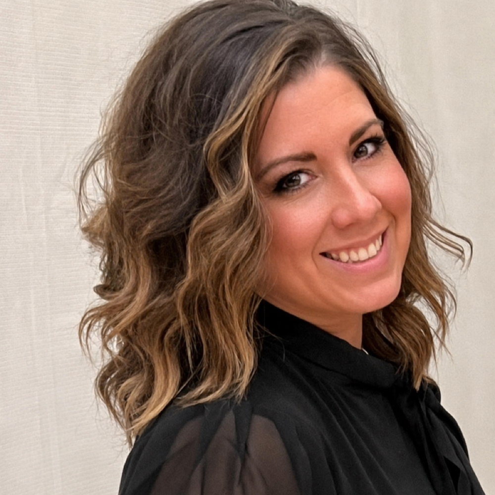 Kelli Carpinello at Liquid Glam Spray Tans in Erie, PA