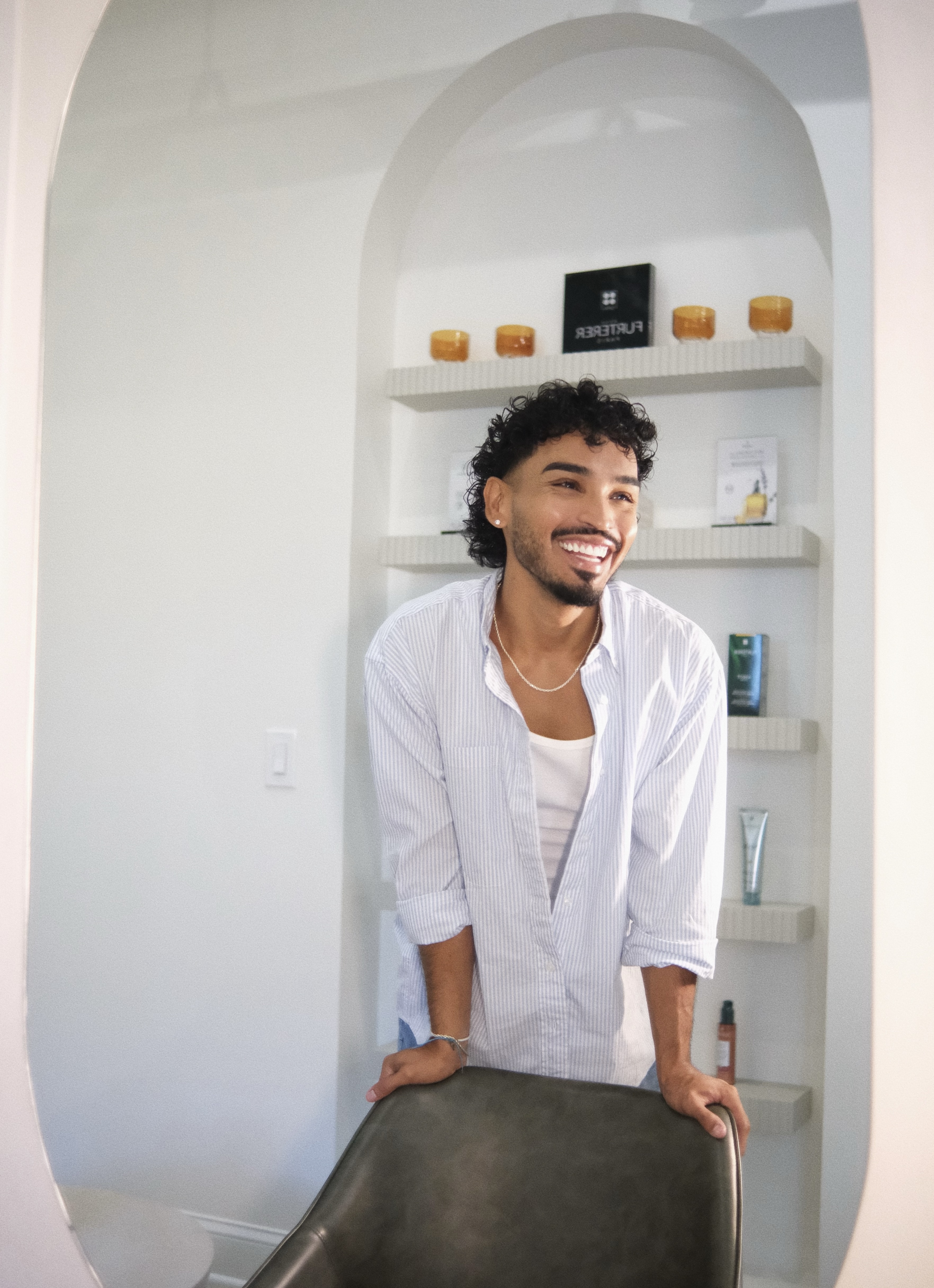 Emmanuel Gil at OLLINA Salon in Metuchen, NJ