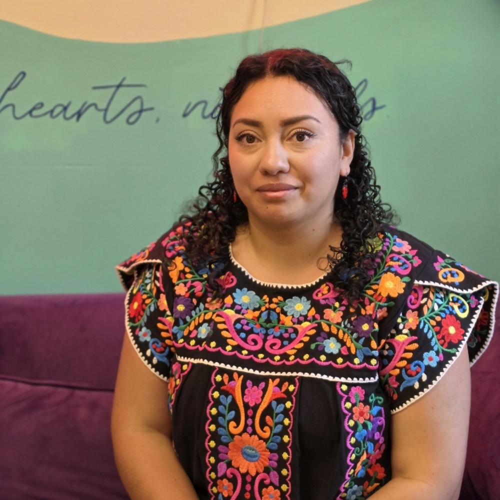 Miriam Raygoza - books open at Heartbreak Nail Club in Asheville, NC