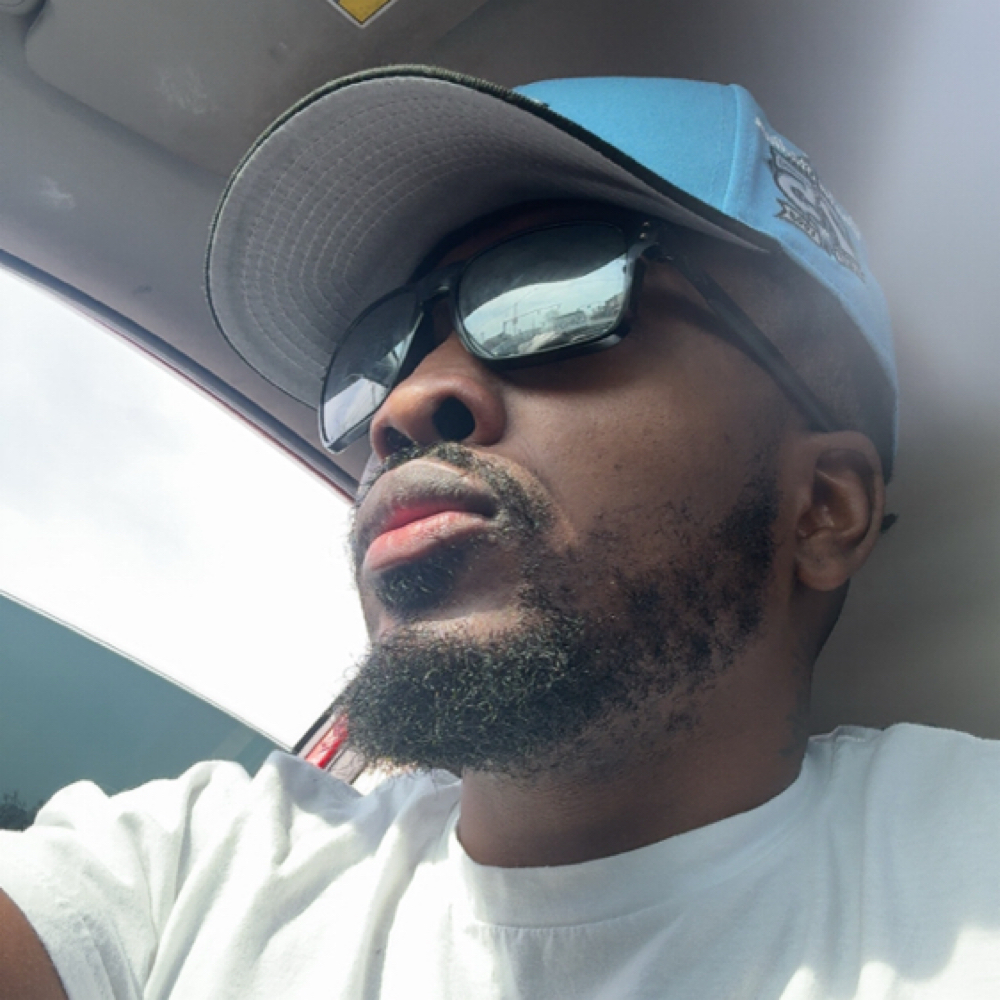 Quees Bishop at Saballa’s Empire Barbershop in North Kingstown, RI