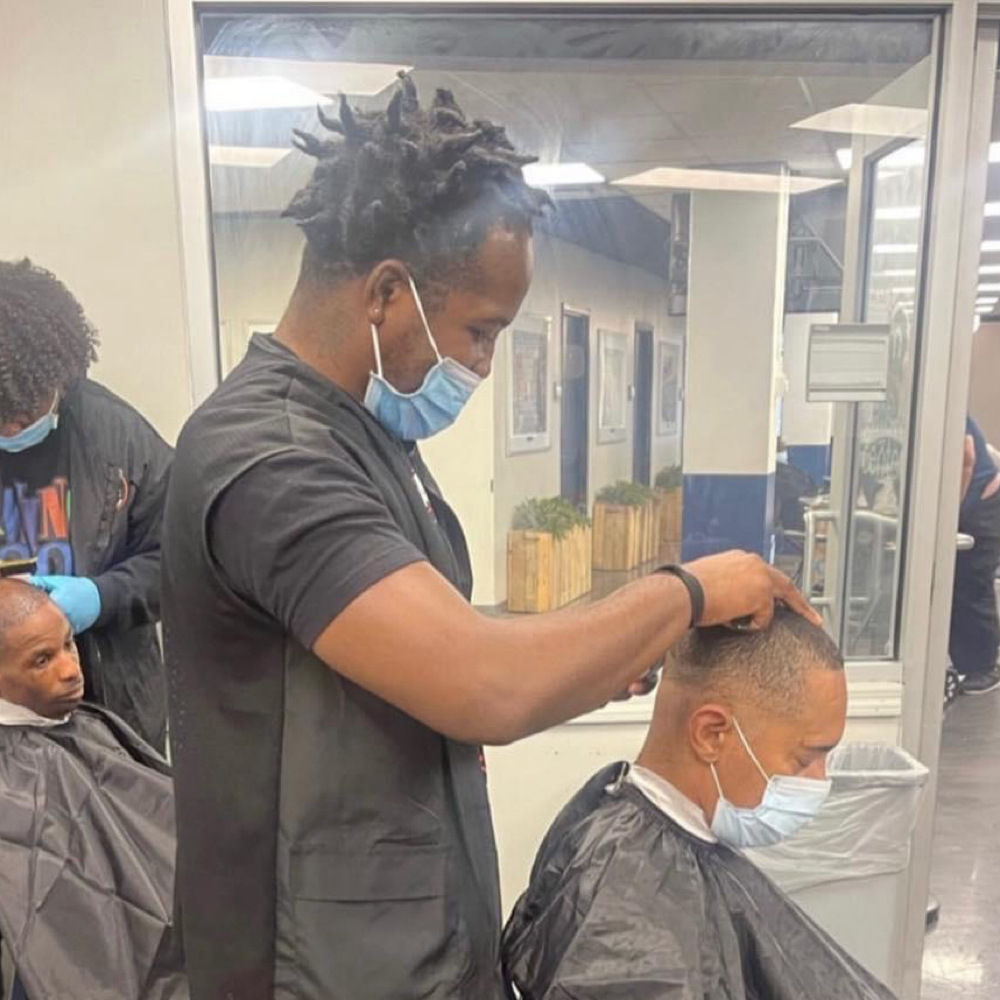 Quees Bishop at Saballa’s Empire Barbershop in North Kingstown, RI