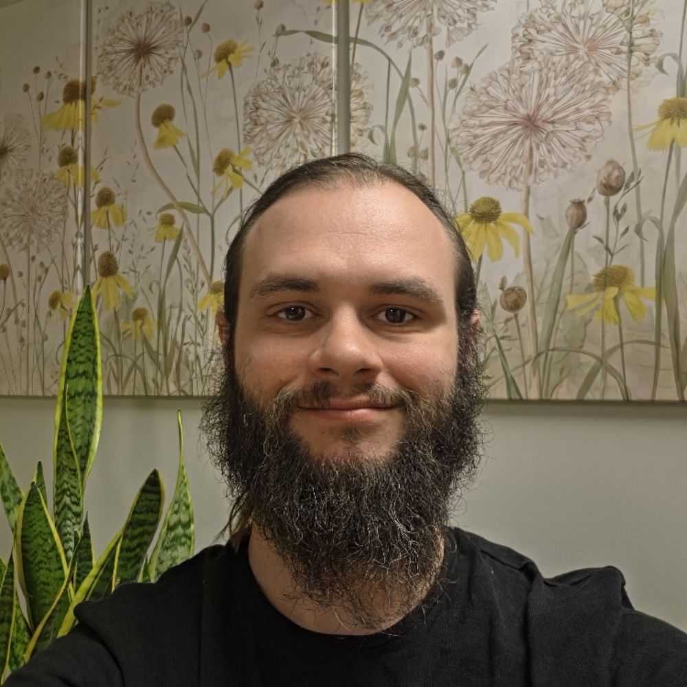 Justin Czysz at Poignant Dandelion Massage in Greenfield, WI