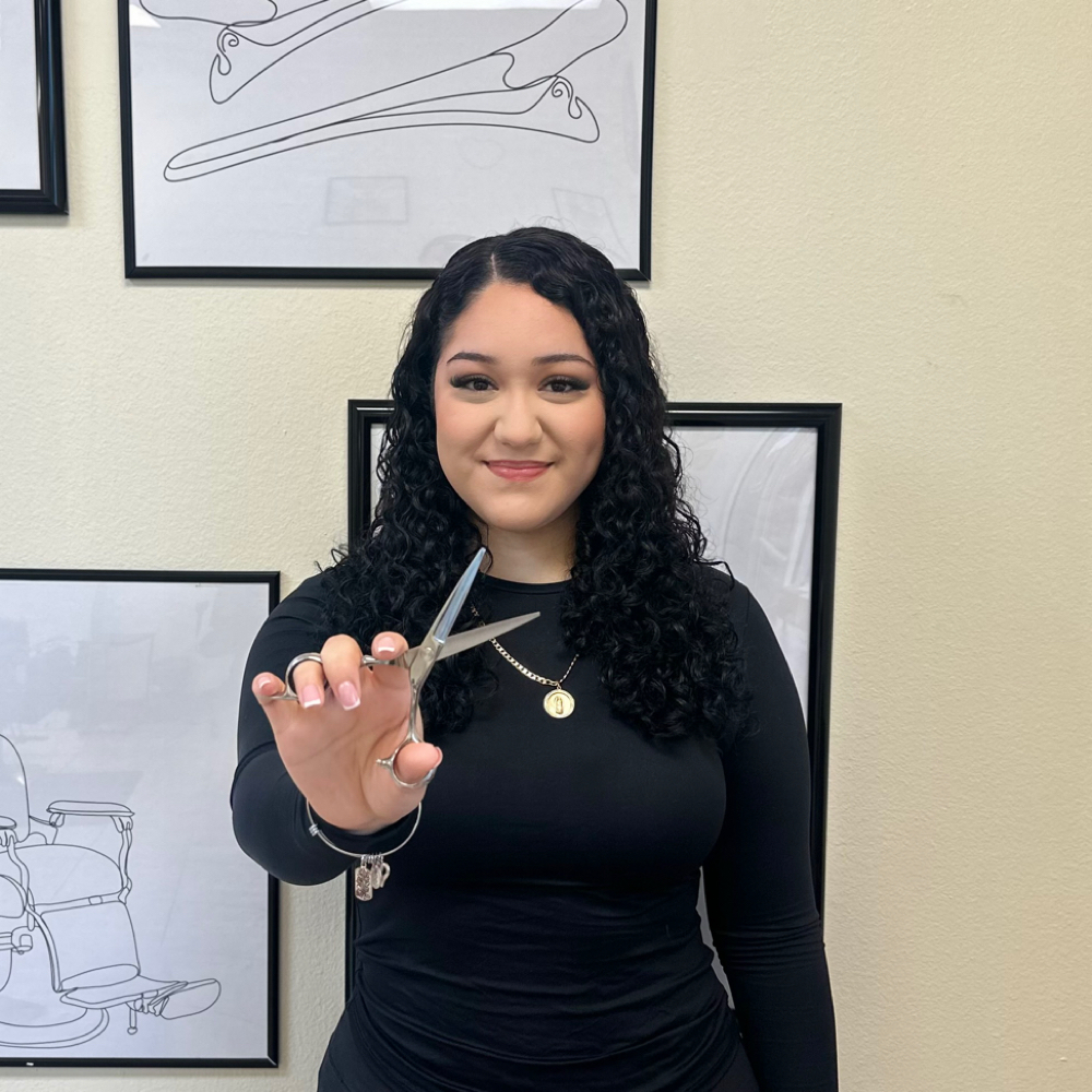 Susie De los Santos at Hair IQ Salon & Spa in Weslaco, TX