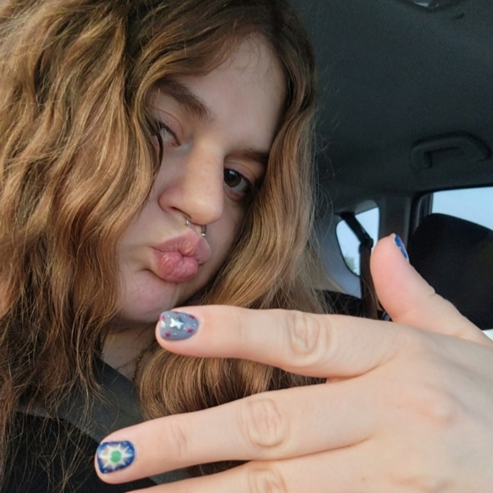 Zoe Paradissis at Divine Design Nailz in St. Peters, MO