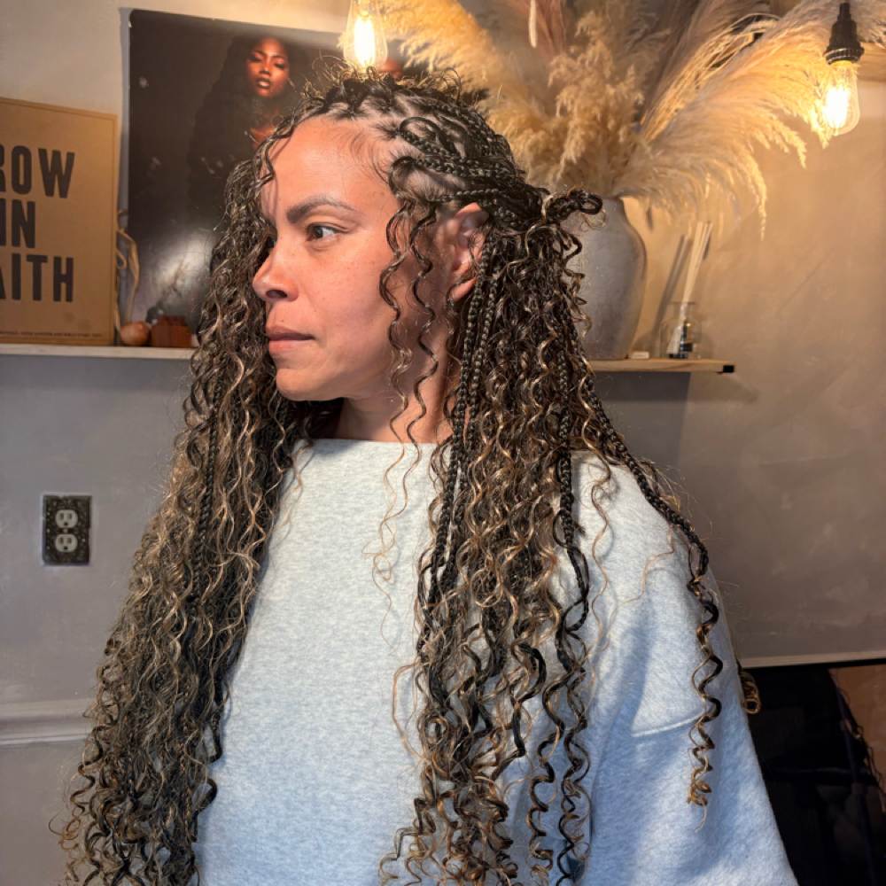 Mame Diagne at Apple Hair Braiding in New Haven, CT