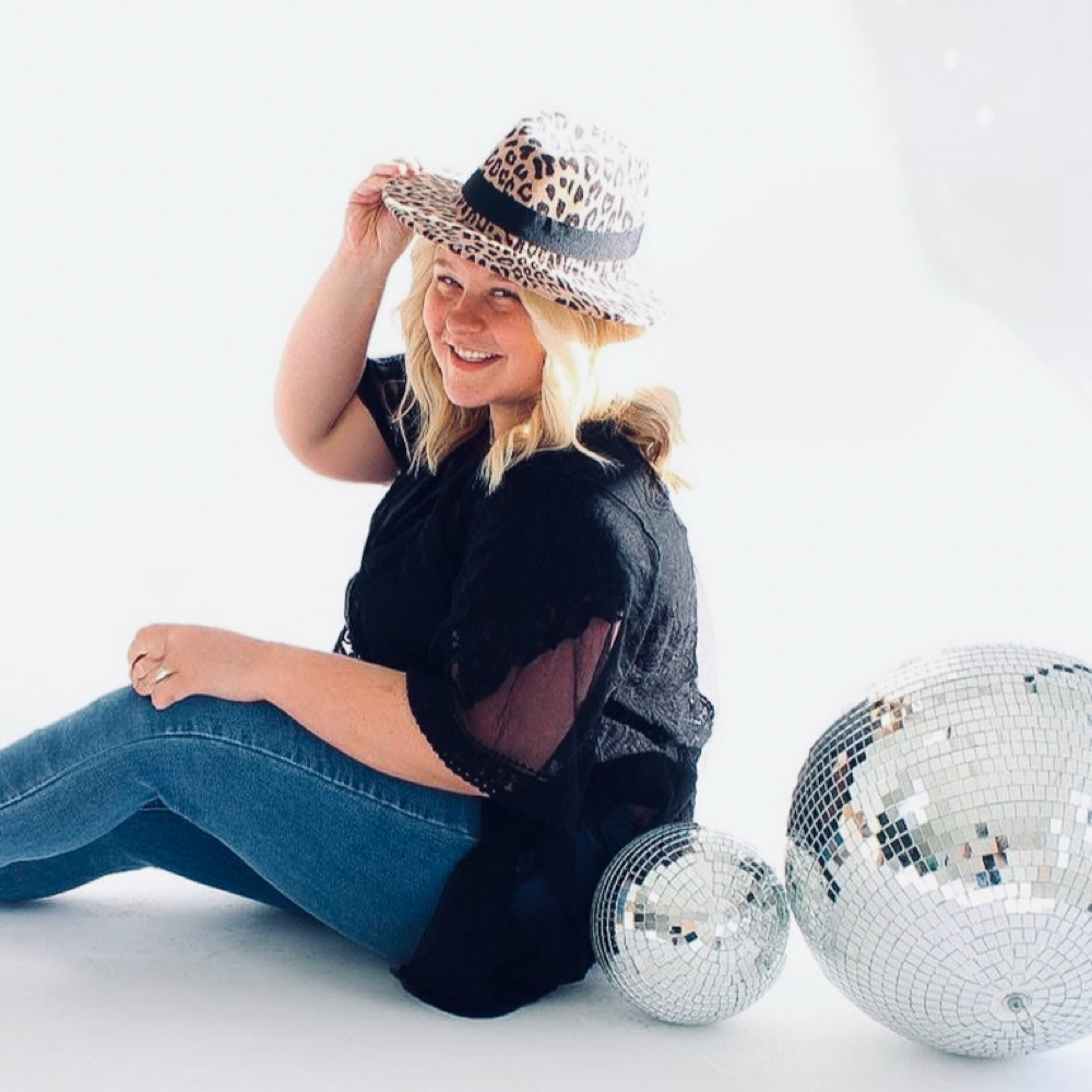 Raeonna Thompson at Hairapy Salon in Cincinnati, OH