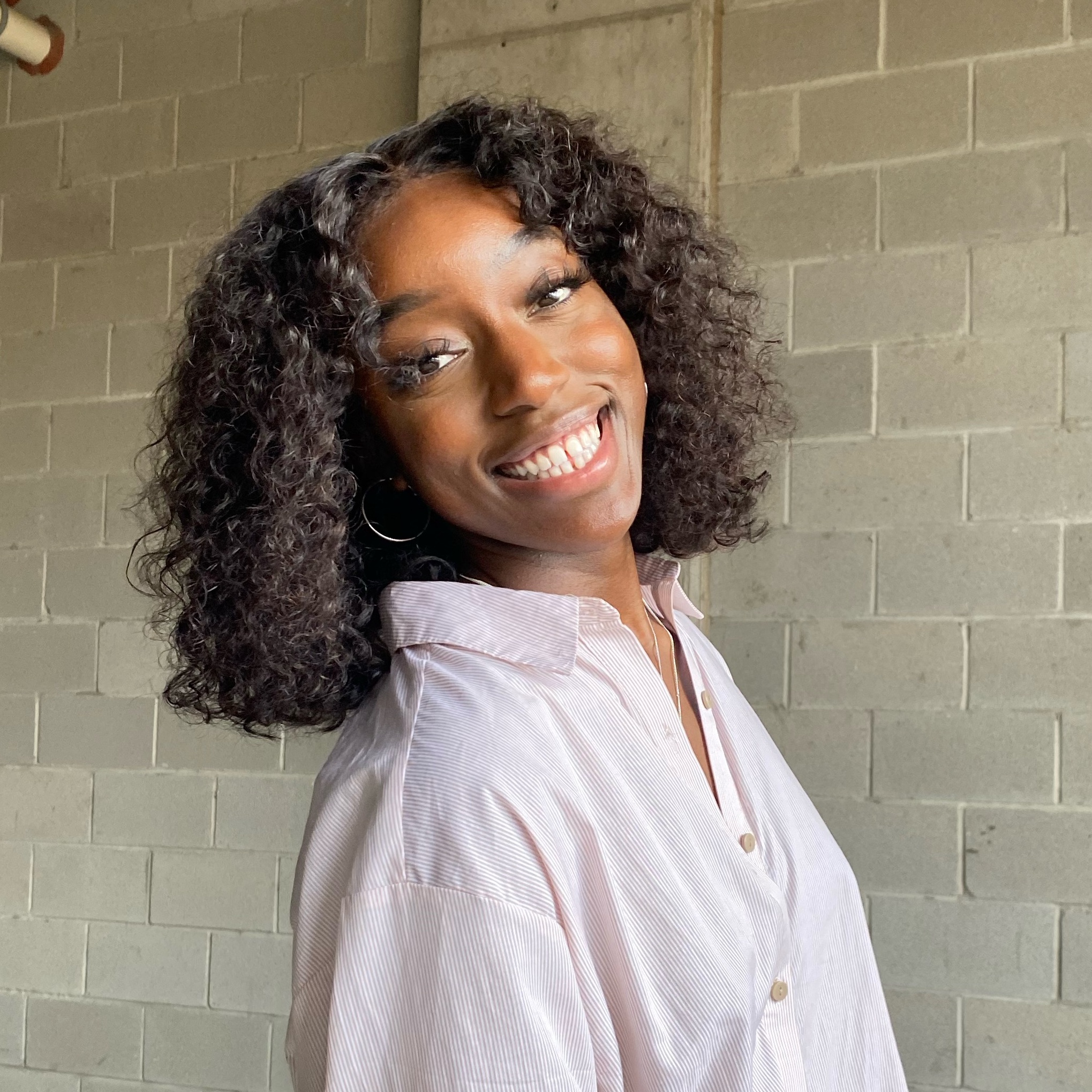 Favour Unegbu at Helena Braiding & Barber Lounge in Houston, TX